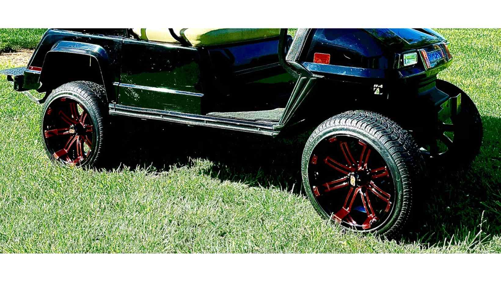 Close up of golf cart wheels and tires