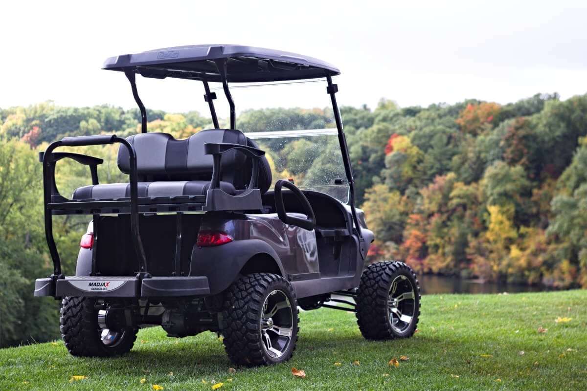 Golf Cart with a back seat overlooking a scenic river