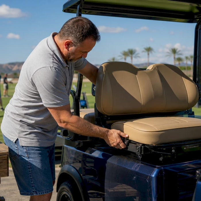 Craftsman fitting custom golf cart seat outdoors