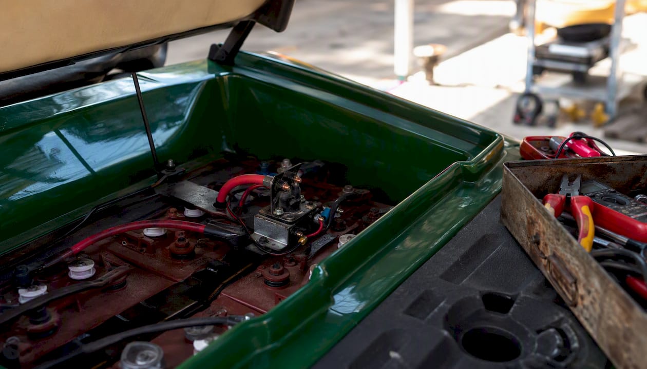 Close-up of golf cart solenoid and wiring
