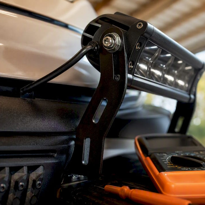 Slotted bracket mounting a golf cart light bar