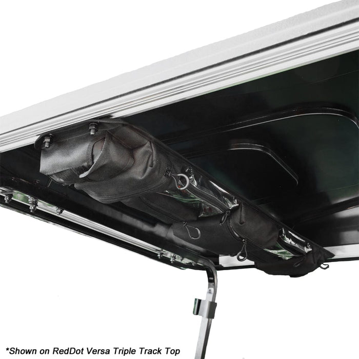 Car roof rack system with bags on a white background