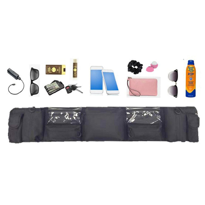 Black waist bag with various items on a white background