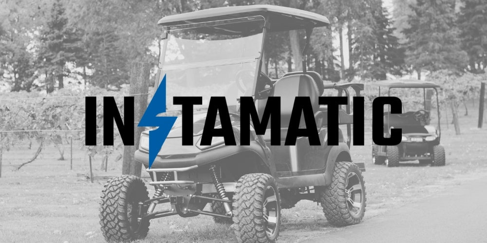 Instamatic® brand logo with black and white golf carts