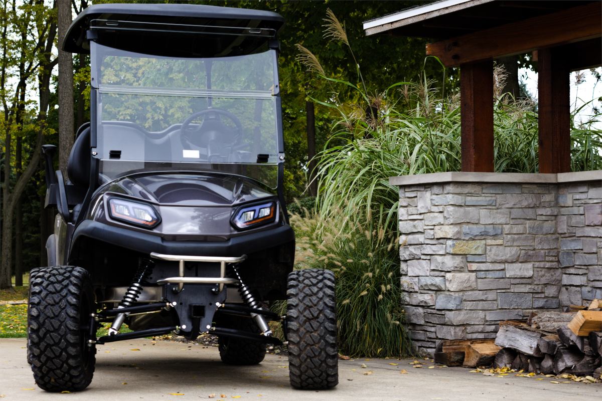 Golf cart with a windshield installed