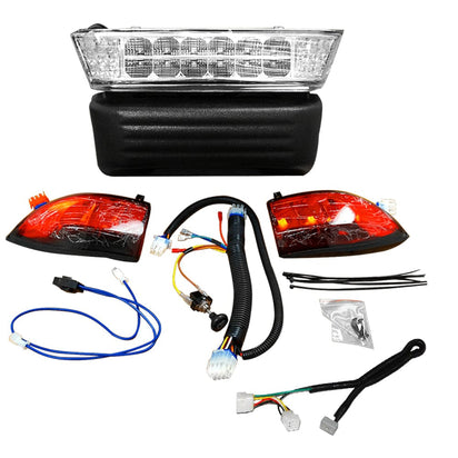 Automotive tail light assembly with wiring harnesses on a white background