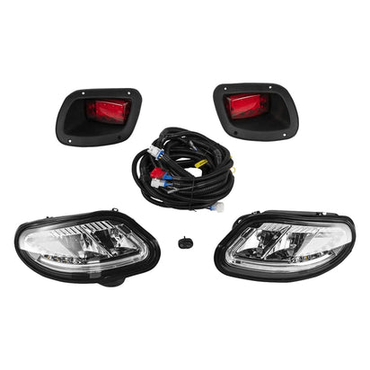 Set of car headlights and fog lights with wiring on a white background