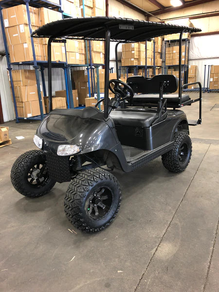 EZGO RXV with a light kit, lift kit, and wheels and tires installed